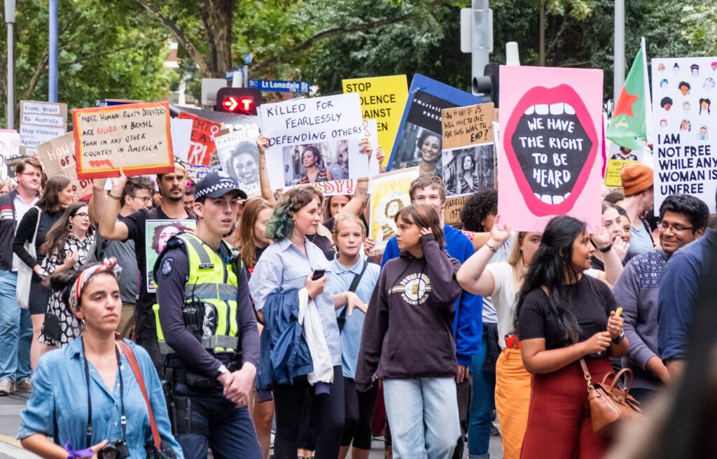 MELBOURNE, AUSTRALIA - MARCH 08 : Protestors hold placards during a rally on International Women's Day Rally in the City of Melbourne, Australia on March 08, 2019. Demonstrators marched demanding a number of issues including women's rights, violence against women and equal pay. (Photo by Asanka Brendon Ratnayake/Anadolu Agency/Getty Images)