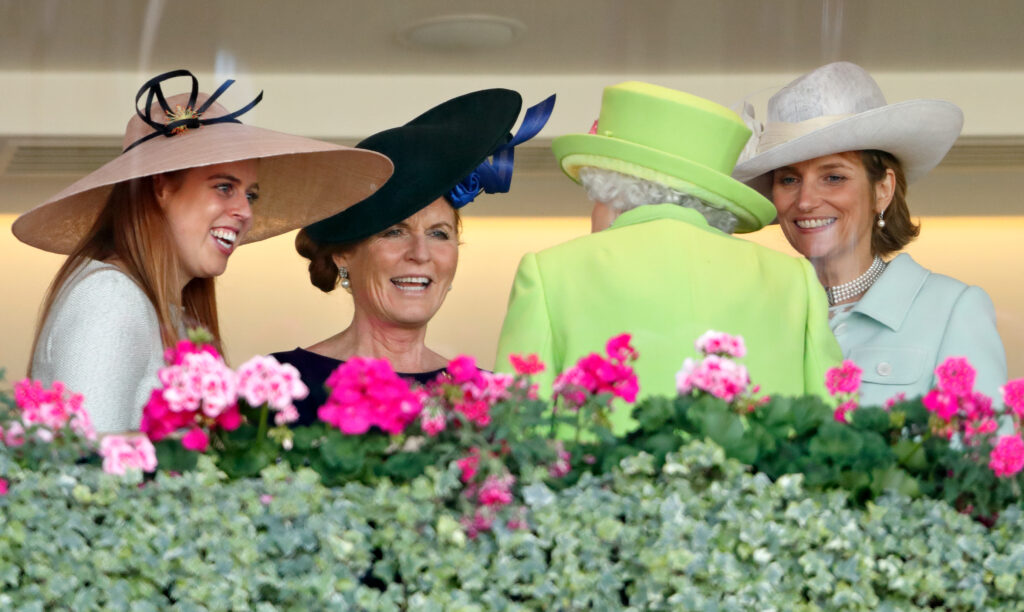 Fergie, along with Princess Beatrice and Lady Carolyn Warren, laughing with Queen Elizabeth at the 2018 Royal Ascot.