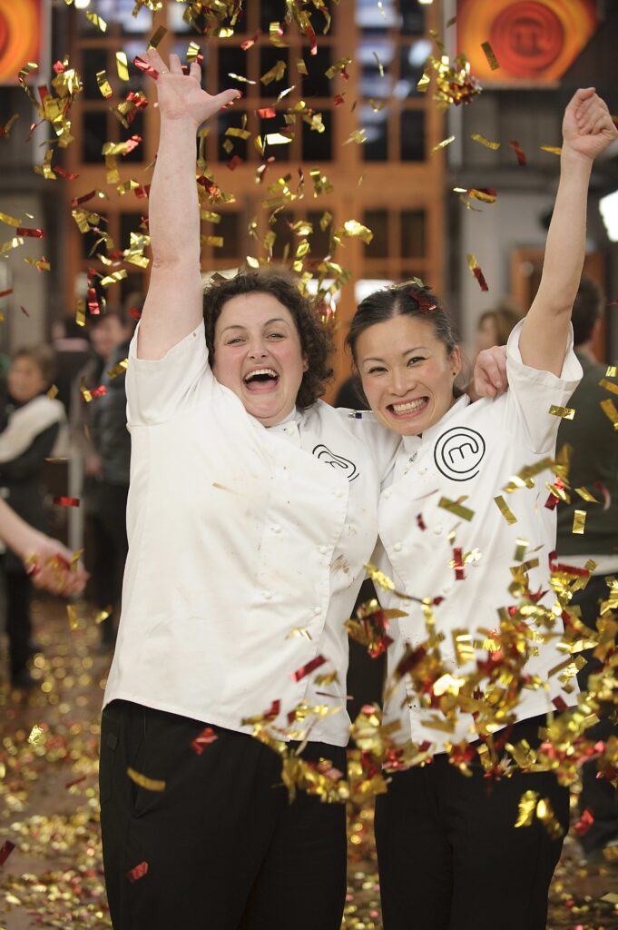 A supplied photo of the winner of Network Ten's reality show MasterChef Julie Goodwin (left) and runner-up Poh Ling Yeow at the conclusion of the show on Sunday, July 19, 2009. Goodwin became Australia's first ever MasterChef. (AAP Image/Ten)