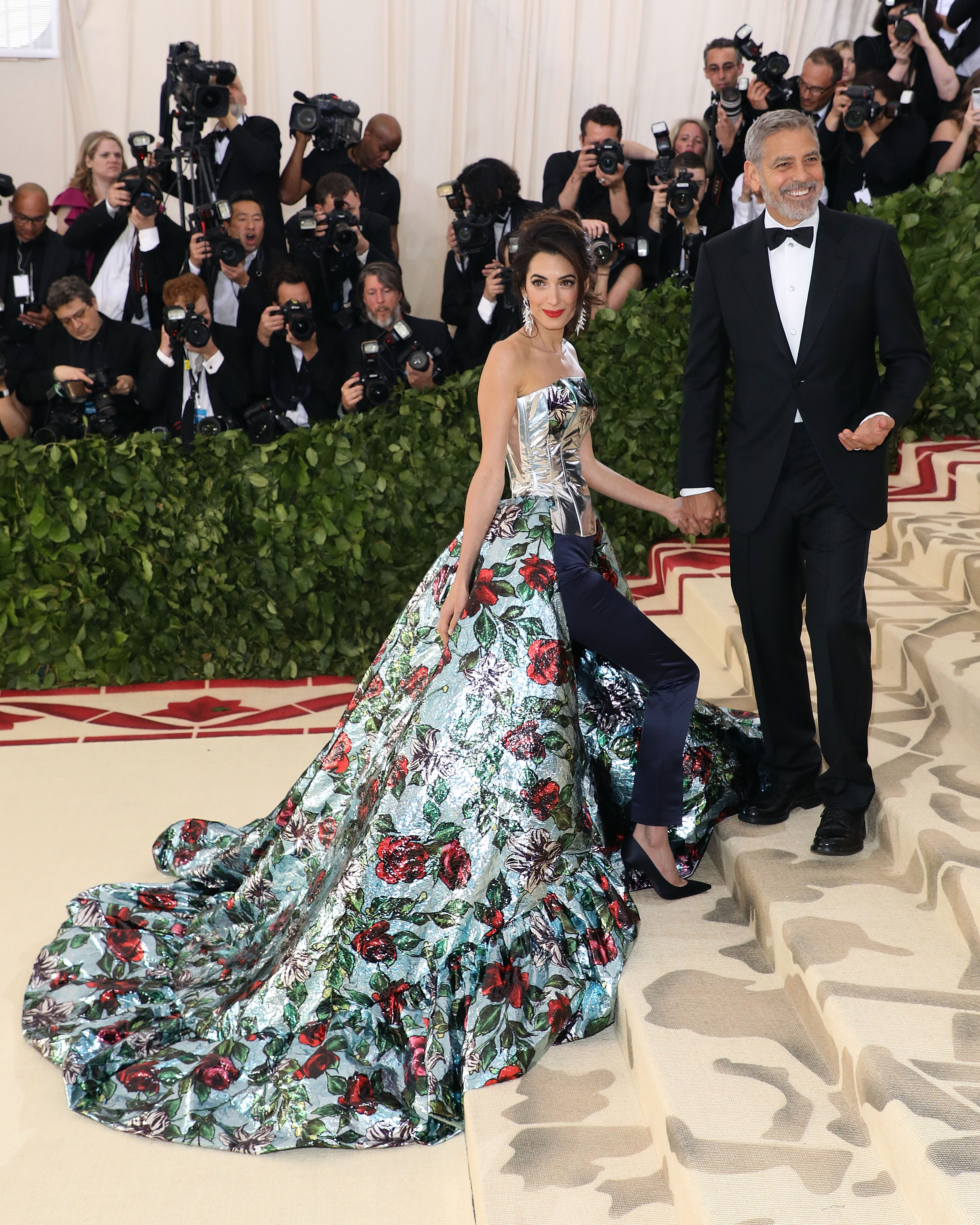 NEW YORK, NY - MAY 07:  Amal Clooney and George Clooney attend "Heavenly Bodies: Fashion & the Catholic Imagination", the 2018 Costume Institute Benefit at Metropolitan Museum of Art on May 7, 2018 in New York City.  (Photo by Taylor Hill/Getty Images)