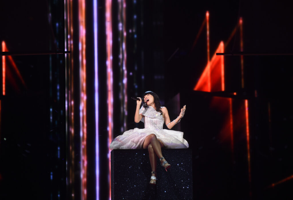 Australian musician Dami Im performing live on the Eurovision stage.