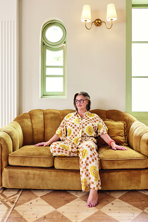Julie Goodwin sitting on a couch
