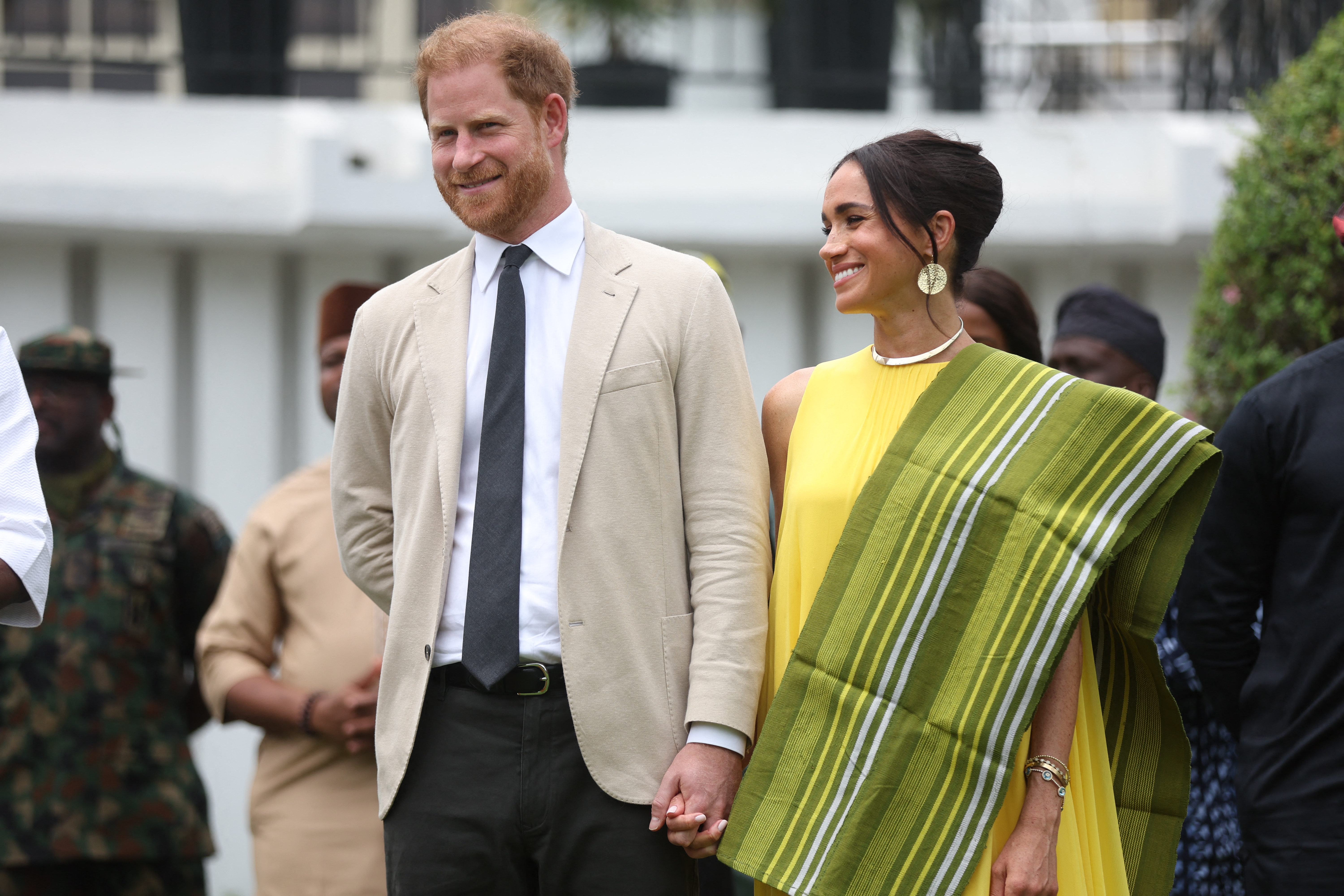harry and meghan news: Prince Harry and Meghan Markle in Lagos