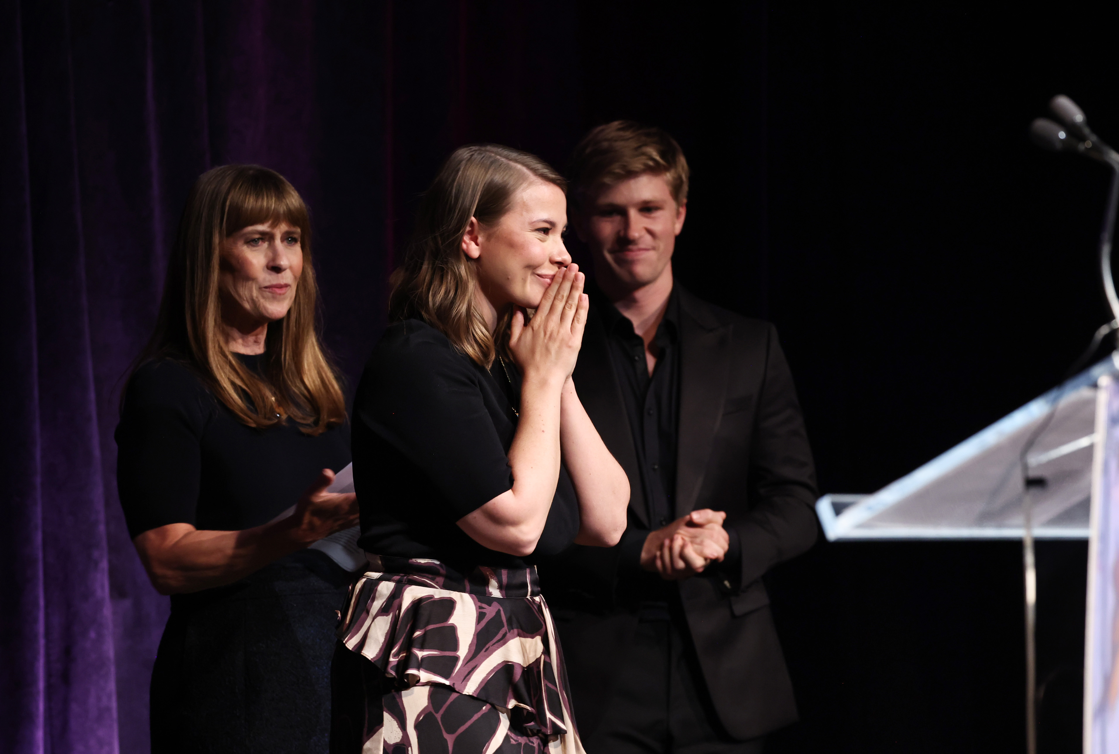 Terri Irwin, Blossom Award Honouree Bindi Irwin, and Robert Irwin speak onstage during the Endometriosis Foundation Of America's 12th Annual Blossom Ball  in New York City 2024.