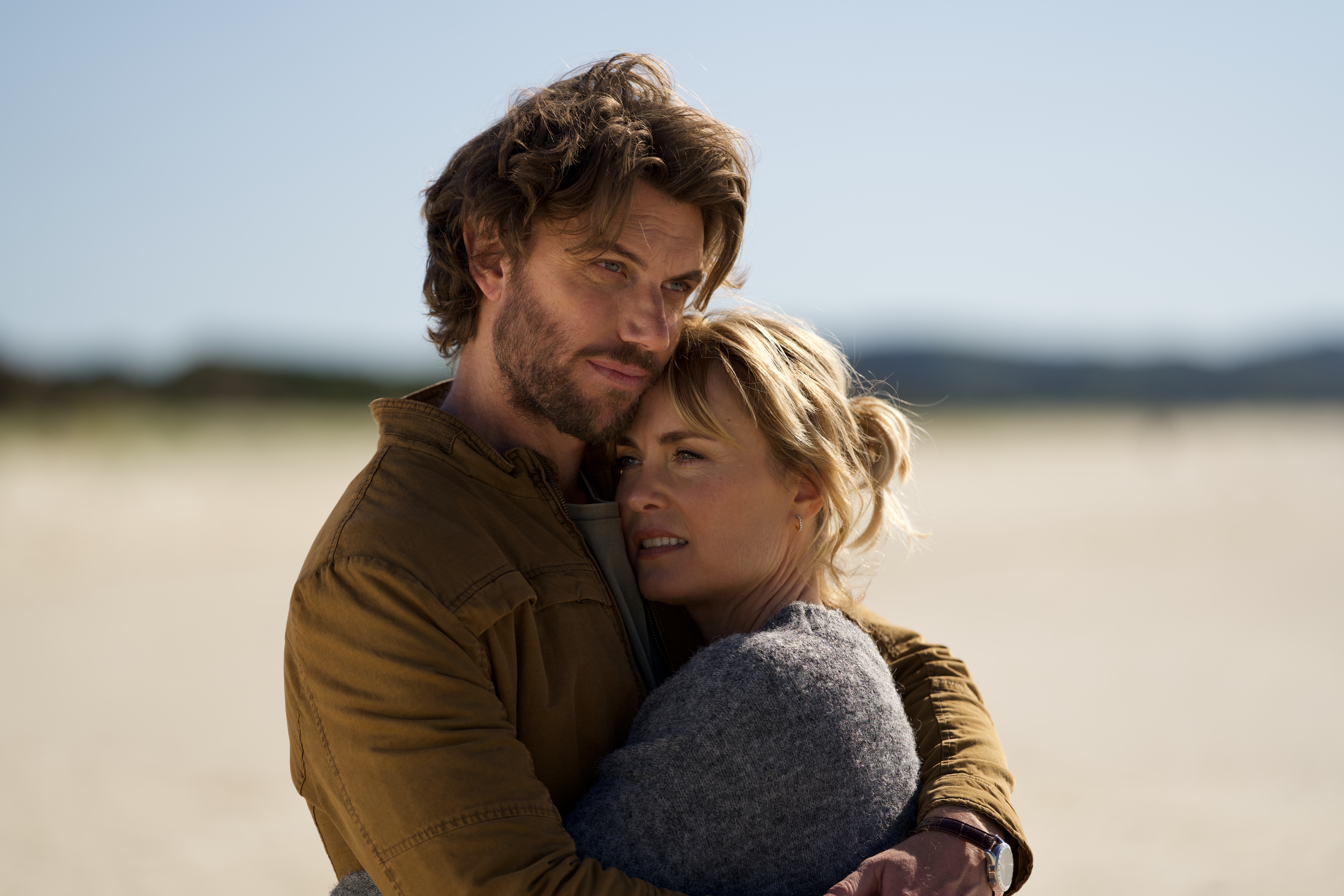 Adam Demos and Radha Mitchell as John and Claire in the film Take My Hand. 