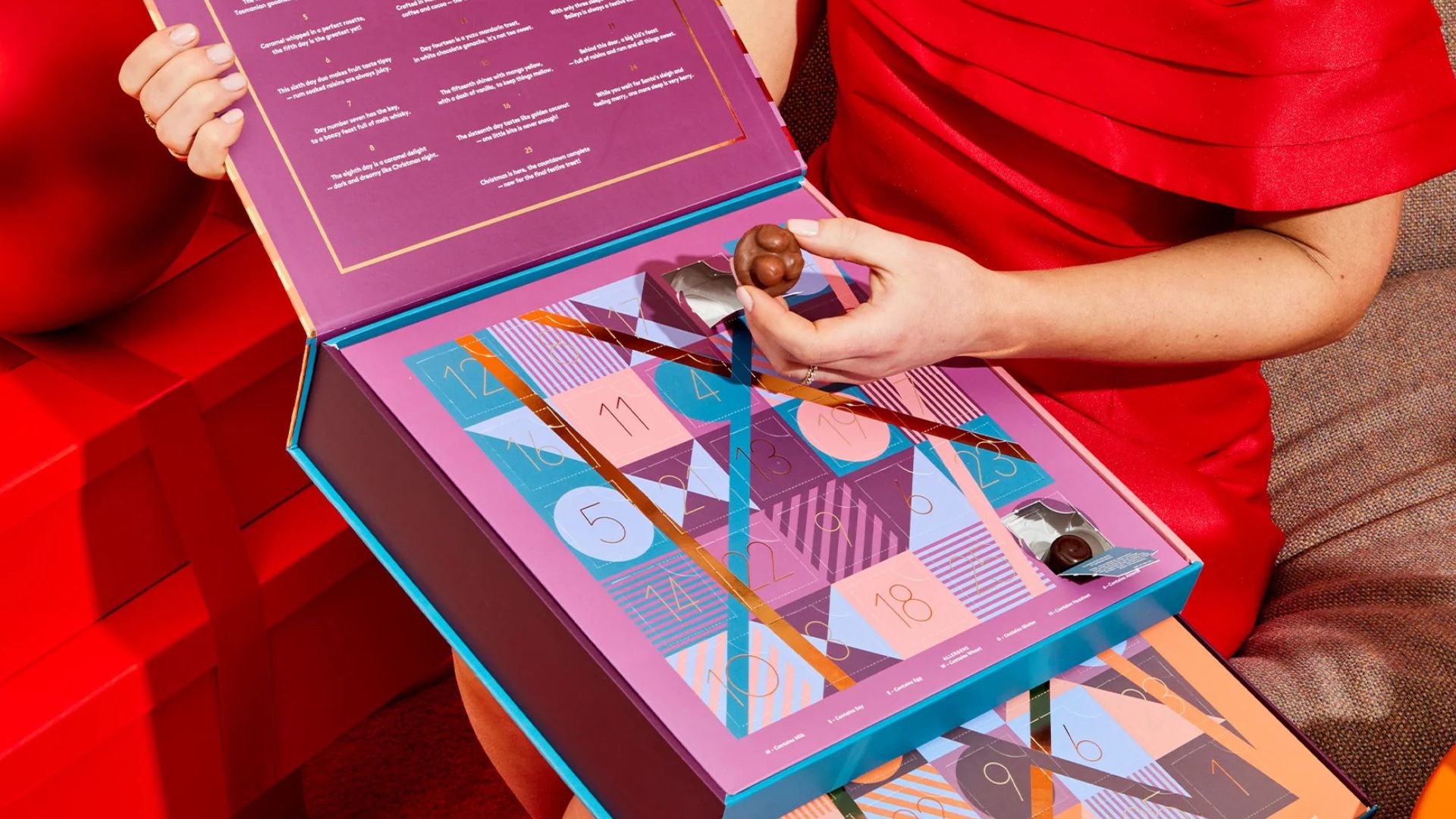 Woman holding the Koko Black Yours & Mine Advent Calendar